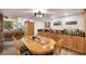 Inviting dining space features a beautiful wooden table, comfortable seating, and elegant decor at 274 Ski Trail Rd, Mount Charleston, NV 89124