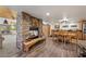 Cozy living space with a stone fireplace and open floor plan at 274 Ski Trail Rd, Mount Charleston, NV 89124