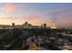 Panoramic sunset view of the Las Vegas skyline and surrounding neighborhood from above at 3111 Bel Air Dr # 12E, Las Vegas, NV 89109