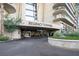 The Regency Towers entrance features manicured landscaping at 3111 Bel Air Dr # 12E, Las Vegas, NV 89109