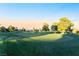 Picturesque view of the lush green golf course with manicured lawns and mature trees at 3111 Bel Air Dr # 12E, Las Vegas, NV 89109