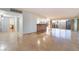 Bright living room with marble floors and balcony access at 3111 Bel Air Dr # 12E, Las Vegas, NV 89109
