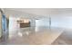 Open concept living area featuring marble floors and mirrors at 3111 Bel Air Dr # 12E, Las Vegas, NV 89109