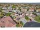 Aerial view of a lovely desert home with solar panels, a spacious driveway and well-kept lawn at 3618 Auckland Castle St, Las Vegas, NV 89135