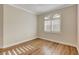 Bedroom with wood floor, shuttered window and base molding at 3618 Auckland Castle St, Las Vegas, NV 89135