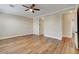 Serene bedroom offering wood-look floors, ceiling fan, and neutral paint at 3618 Auckland Castle St, Las Vegas, NV 89135