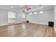 Open bonus room with views of the upstairs landing and wood flooring at 3618 Auckland Castle St, Las Vegas, NV 89135