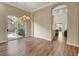 Open-concept dining area with sliding doors and hardwood floors at 3618 Auckland Castle St, Las Vegas, NV 89135