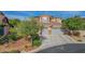 Beautiful home featuring a three-car garage, manicured landscaping and a cozy exterior design at 3618 Auckland Castle St, Las Vegas, NV 89135