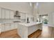 Modern, well-lit kitchen with quartz countertops, stainless steel appliances, and ample cabinet space at 3618 Auckland Castle St, Las Vegas, NV 89135