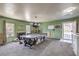 Large game room featuring a pool table, carpet, and laundry hookups at 3708 Calumet Farm Cir, North Las Vegas, NV 89031