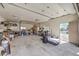 This large garage is filled with storage at 3708 Calumet Farm Cir, North Las Vegas, NV 89031