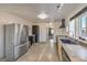 Spacious kitchen featuring stainless steel refrigerator and an open design at 3708 Calumet Farm Cir, North Las Vegas, NV 89031