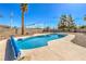 Private backyard pool with concrete surround and desert landscaping at 3708 Calumet Farm Cir, North Las Vegas, NV 89031