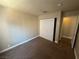 This bedroom features neutral carpet, a closet, and fresh paint at 4050 Pacific Harbors Dr # 217, Las Vegas, NV 89121