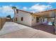 Exterior shot of the home featuring a covered patio area and the inviting backyard pool at 4128 Tarkin Ave, Las Vegas, NV 89120