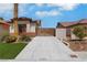Wide driveway and gated area showcase the home's curb appeal and add security and privacy at 4128 Tarkin Ave, Las Vegas, NV 89120