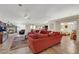 Bright and airy living room featuring tile floors, a fireplace, and comfortable seating, creating a welcoming atmosphere at 4128 Tarkin Ave, Las Vegas, NV 89120