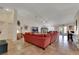 Large living area with a cozy fireplace, tile flooring, and expansive layout, ideal for relaxing and entertaining guests at 4128 Tarkin Ave, Las Vegas, NV 89120