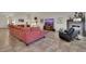 Expansive living room featuring tile floors, a cozy fireplace, and comfortable seating, perfect for entertaining at 4128 Tarkin Ave, Las Vegas, NV 89120