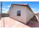 Exterior shot highlights the terra cotta patio and stucco exterior walls at 4149 Compass Rose Way, Las Vegas, NV 89108
