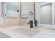 Bathroom boasts updated vanity with modern fixtures, quartz counters, and ample lighting at 4149 Compass Rose Way, Las Vegas, NV 89108