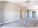 Spacious bedroom with vaulted ceiling, carpeted floors, and a walk-in closet at 4149 Compass Rose Way, Las Vegas, NV 89108
