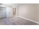 Bedroom offers neutral walls, carpeted floor, and a sizable closet for ample storage at 4149 Compass Rose Way, Las Vegas, NV 89108