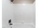 White tiled shower featuring black fixtures at 4149 Compass Rose Way, Las Vegas, NV 89108
