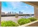 View from the balcony showcasing parking and nearby high rise buildings at 4200 S Valley View Blvd # 1074, Las Vegas, NV 89103