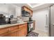 Modern kitchen featuring stainless steel appliances and granite countertops, with a convenient breakfast bar at 4200 S Valley View Blvd # 1074, Las Vegas, NV 89103