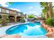 Enjoy the backyard pool and spa with plenty of space for entertaining and relaxing at 4200 Scott Peak Ct, Las Vegas, NV 89129