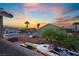 Home backyard view features a boat and trailer parked behind a secure, walled-in area at 4200 Scott Peak Ct, Las Vegas, NV 89129
