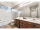 Functional bathroom with dual sinks, a tub-shower combo, and tiled floor at 4200 Scott Peak Ct, Las Vegas, NV 89129