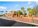 Charming two-story home featuring desert landscaping, palm trees and three-car garage at 4200 Scott Peak Ct, Las Vegas, NV 89129