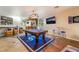 Entertaining game room with pool table, bar area, and sports-themed decor at 4200 Scott Peak Ct, Las Vegas, NV 89129