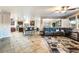 Spacious living area with open floor plan connecting the living room to the kitchen at 4200 Scott Peak Ct, Las Vegas, NV 89129