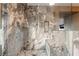 Close-up of a modern marble shower featuring a rainfall showerhead and built-in bench at 4200 Scott Peak Ct, Las Vegas, NV 89129