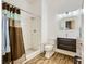 Modern bathroom showcasing tiled walls, sleek vanity, and glass enclosed shower at 440 N Lisbon St, Henderson, NV 89015