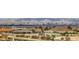 Panoramic view of the city skyline and mountains from a residential neighborhood at 440 N Lisbon St, Henderson, NV 89015