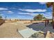 Wide front yard with desert landscaping, a circular driveway and a long view at 440 N Lisbon St, Henderson, NV 89015