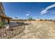 Expansive front yard featuring desert landscaping and circular driveway at 440 N Lisbon St, Henderson, NV 89015