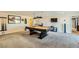 Spacious game room with a pool table, carpeted flooring and recessed lights at 440 N Lisbon St, Henderson, NV 89015