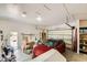 Attached two-car garage featuring an automatic door, shelving, and space for a vehicle or storage at 440 N Lisbon St, Henderson, NV 89015