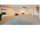 Large open living room features recessed lighting, neutral carpet and several doorways at 440 N Lisbon St, Henderson, NV 89015