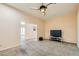 Comfortable room featuring a ceiling fan and an adjacent doorway at 440 N Lisbon St, Henderson, NV 89015