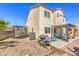 This backyard includes a trampoline, grill, seating, and desert landscaping for outdoor enjoyment at 4514 Calico Cliff Ct, North Las Vegas, NV 89031