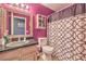 Bathroom featuring a sink, vanity lighting, and a mirrored medicine cabinet over the toilet at 4514 Calico Cliff Ct, North Las Vegas, NV 89031