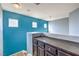 Upstairs landing with built in cabinet and three windows allowing in lots of natural light at 4514 Calico Cliff Ct, North Las Vegas, NV 89031