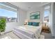 Inviting bedroom with a king-sized bed, serene atmosphere and plenty of light at 5429 Succulent Rose Dr, Las Vegas, NV 89135
